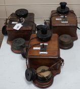 Three Ericsson oak cased railway signal box telephones, largest 30cms long