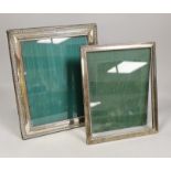 Two modern silver mounted rectangular photograph frames, largest, 32cm.