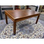 An Art Deco rectangular mahogany library table with leather inset top, bears Howard & Son retail