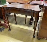 An 18th century mahogany folding tea table, width 83cm, depth 40cm, height 72cm