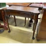 An 18th century mahogany folding tea table, width 83cm, depth 40cm, height 72cm