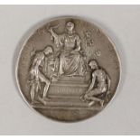 A cased Eton silver fencing medal, 1916, 62 mm, inscribed ‘First Prize 1916 I. M. Pelham-Burn’