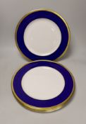 Six Asprey, London, blue and gilt banded dinner plates, 34cms diameter