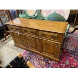 A reproduction 18th century style oak low dresser, fitted three drawers over three cupboards, length