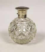A George V silver and tortoiseshell pique mounted heavy cut glass scent bottle, London, 1921, height