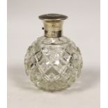 A George V silver and tortoiseshell pique mounted heavy cut glass scent bottle, London, 1921, height