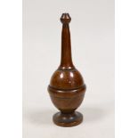 Treen specific gravity measure. 12cm tall