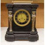 A large Victorian Broxell Brighton, black slate mantel clock with bronze figural mounts, 40cms