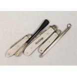 Three assorted mother of pearl mounted silver fruit knives, largest 82mm, a cigarette holder and a