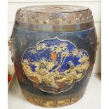 A Chinese lacquer decorated wood barrel form seat/storage container, 40cms high