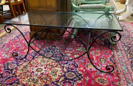 A contemporary metal and glass top rectangular wrought iron coffee table, width 110cm, depth 53cm,