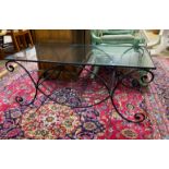 A contemporary metal and glass top rectangular wrought iron coffee table, width 110cm, depth 53cm,