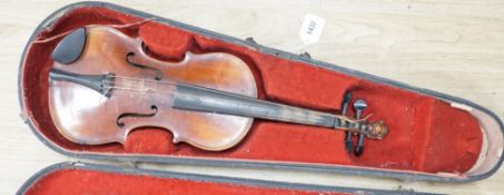 A late 19th century lion head violin and case
