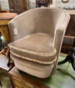 A late 19th century Flemish carved oak dining chair, a pole screen and an upholstered tub chair