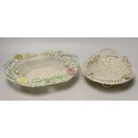 A Belleek coloured basket and similar smaller basket, large coloured basket 29cms wide