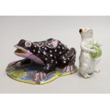 A Masonic faience model of a frog and another, largest 19cm long