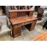 A Victorian style mahogany kneehole desk, length 140cm, depth 64cm, height 110cm