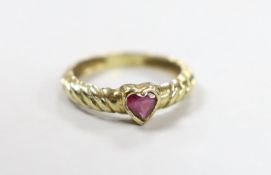 A 1970's 9ct gold and collet set heart shaped single stone garnet ring, size M/N, gross weight 2.1