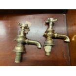 A pair of Sanitan taps, height 14cm