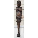 A carved figural wall mount. 64cm tall