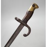 A 19th century French bayonet, dated 1878, 64cms long