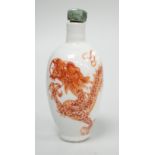 A Chinese rouge-de-fer 'dragon' snuff bottle, late 19th century, 6.7cm Provenance - the former owner