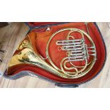 A cased French horn