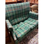 An Edwardian tartan fabric upholstered two seater settee, length 120cm, depth 64cm, height 102cm