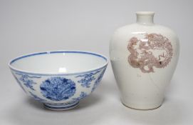 A Chinese underglaze copper red meiping a.f. and a Chinese blue and white bowl. Tallest 15cm