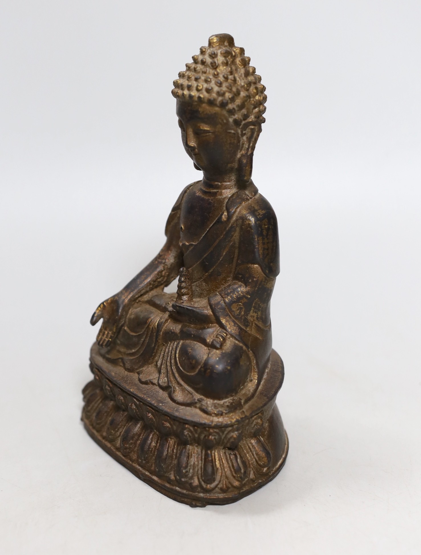 A Chinese gilt iron seated figure of Buddha, 19cm - Image 2 of 4