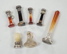 Five assorted 19th century white metal mounted agate seals, largest 61mm, a similar white metal