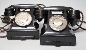 Two black Bakelite telephones with drawers