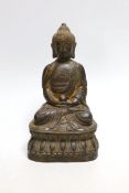 A bronze seated figure of Buddha, 19cms high