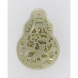 A Chinese celadon jade reticulated pendant. 7cm tall