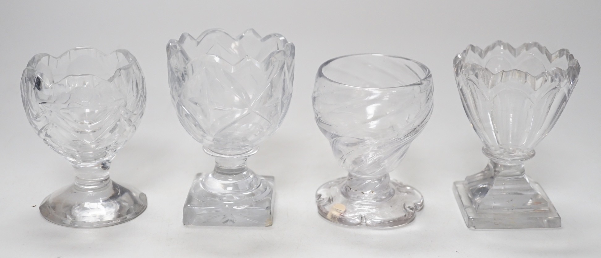 Four 18th century Georgian glass salt cellars, tallest 9cm