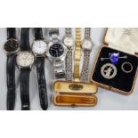 Seven assorted modern wrist watches including Pulsar and Rotary, a 9ct and 'silver' eternity ring, a