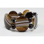 A banded agate oval link and bead bracelet.