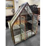 A vintage arched greenhouse on wheeled base, width 136cm, depth 51cm, height 174cm