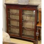 A George III and later mahogany astragal glazed bookcase cabinet, with shelved interior, width