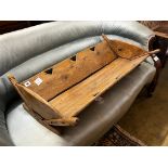 A 19th century French pine rocking crib, length 87cm, depth 48cm, height 18cm