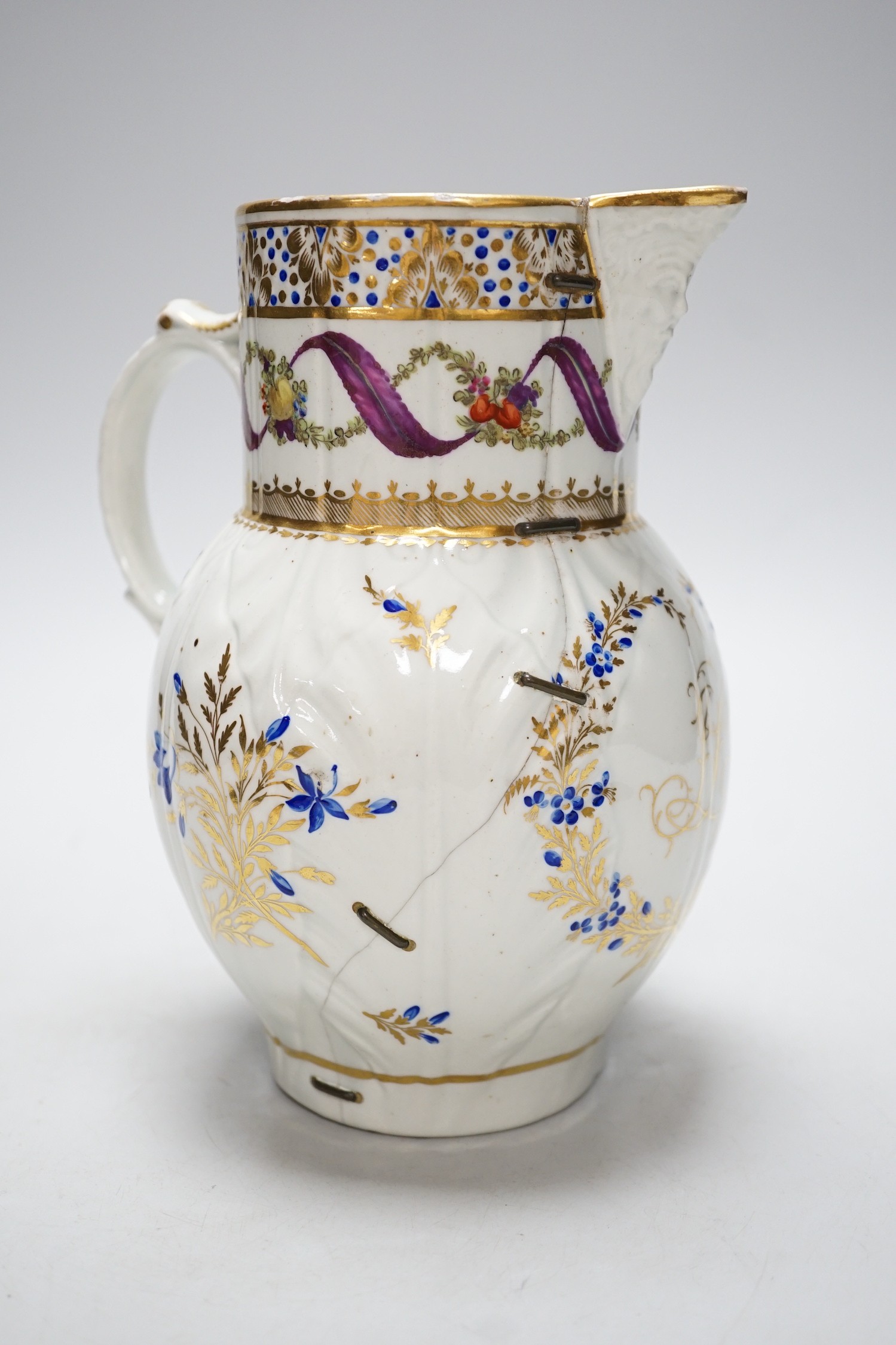 An 18th century Caughley very rare polychrome mask jug, elaboratley painted and gilded with two - Image 3 of 9