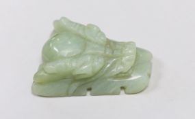 A Chinese bowenite jade dragon’s head belt buckle. 7cm wide