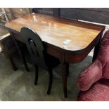 A Regency mahogany folding tea table, width 106cm, depth 52cm, height 77cm and a Victorian oak