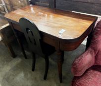 A Regency mahogany folding tea table, width 106cm, depth 52cm, height 77cm and a Victorian oak