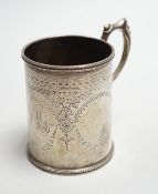 A Victorian engraved silver christening mug, Charles Stuart Harris, London, 1881, height 92mm,