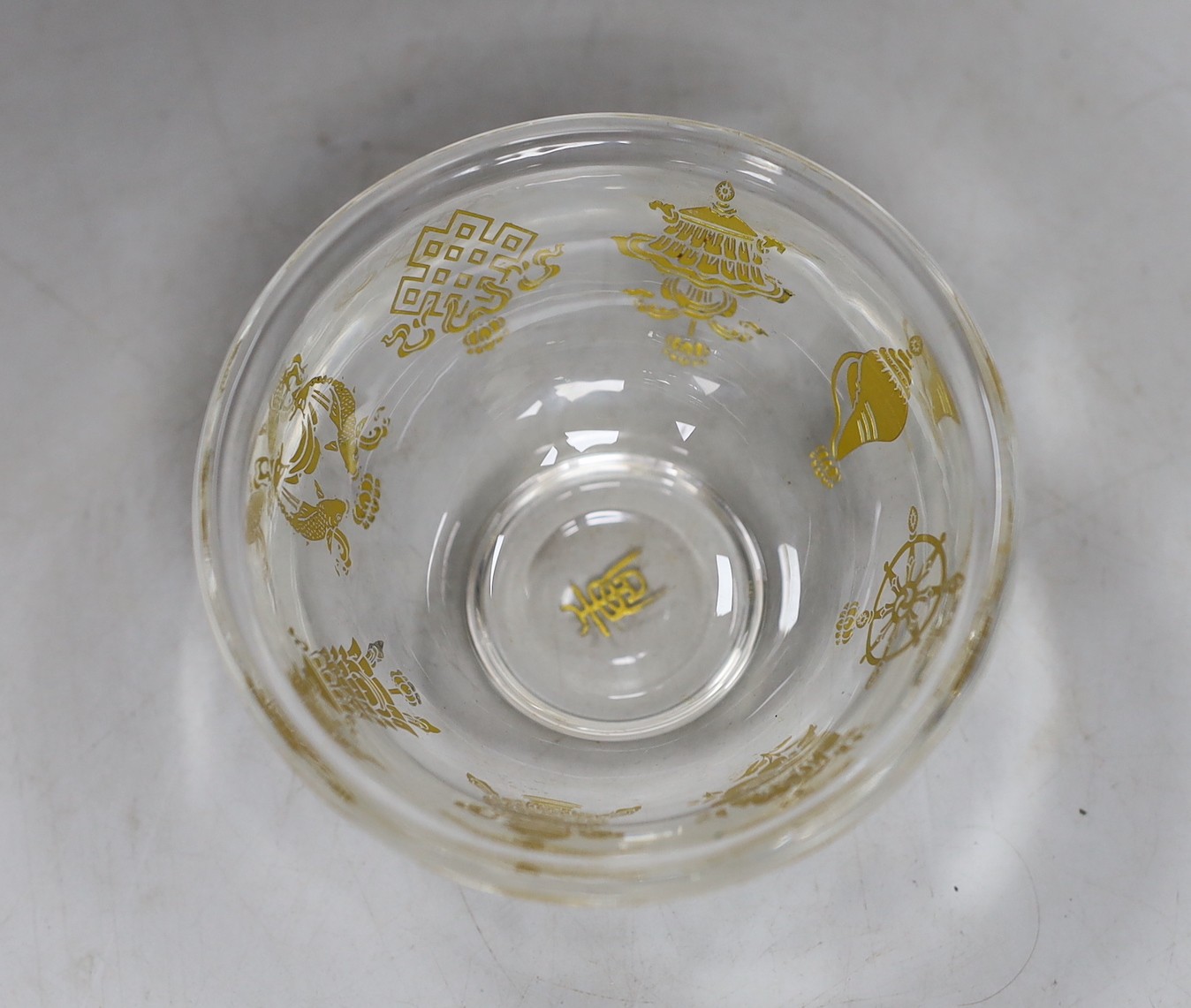 A Tibetan glass dish with gilt interior decoration. 9cm diameter - Image 3 of 4