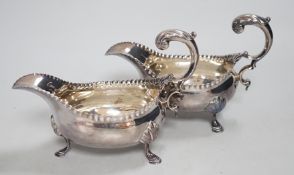 A pair of early George III silver sauceboats, with flying scroll handles, maker, CH, London, 1768,