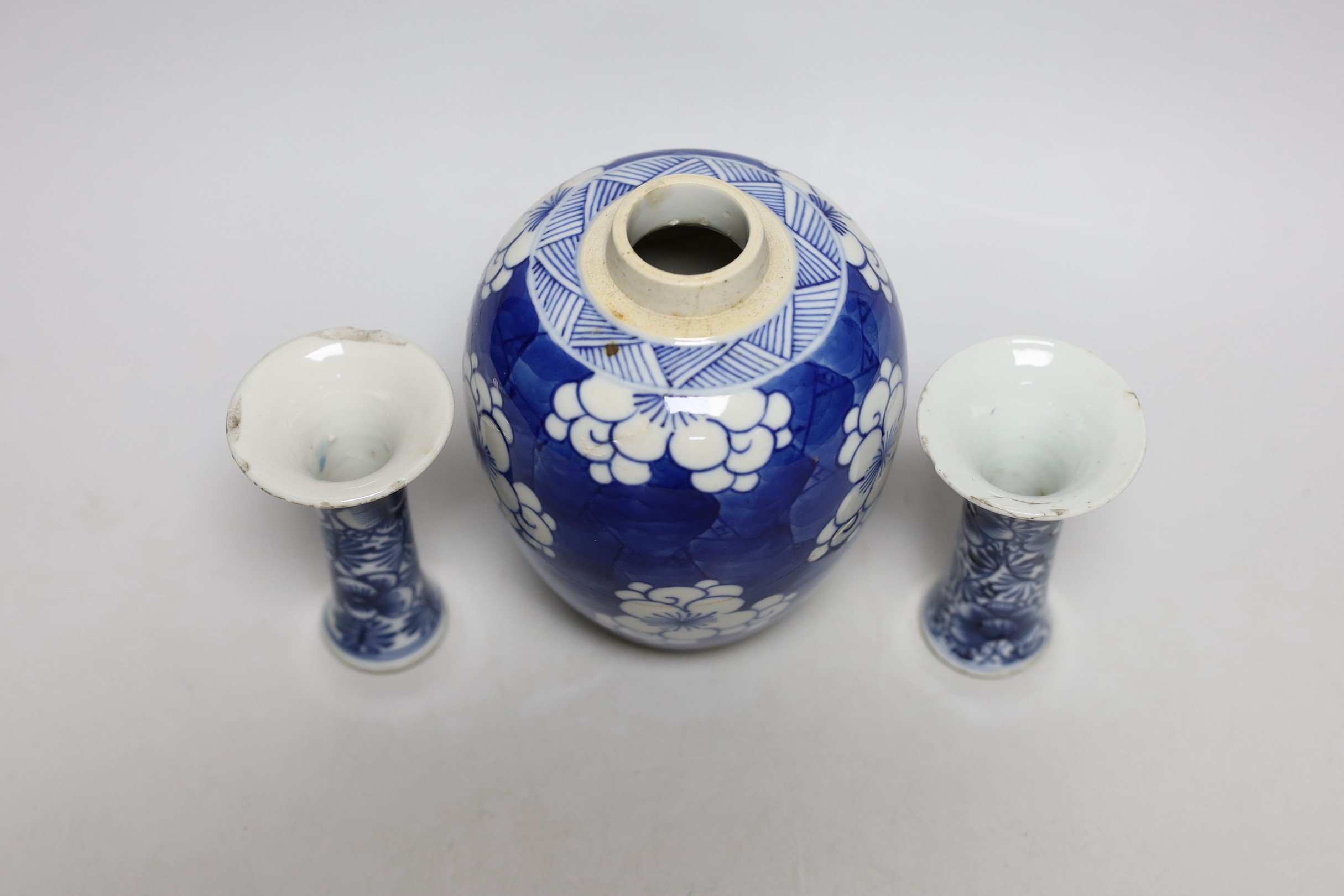 A Chinese blue and white prunus jar, two miniature vases and a dish, all Kangxi period, jar 14cms - Image 6 of 7