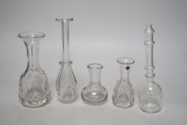 Three 19th century glass measures and two toddy lifts (5), tallest 19cms high,