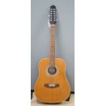 A 12 string acoustic guitar, unknown maker, repaired by John Degay of Degay Guitars